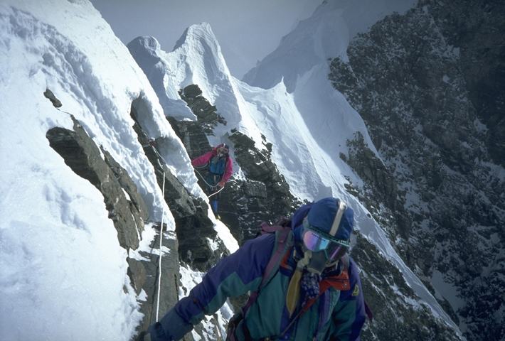 Climbing on the knife edge between the first and Second Pinnacles.